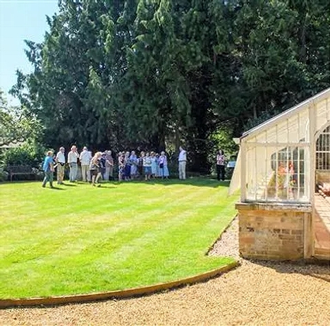 On the greenhouse lawn